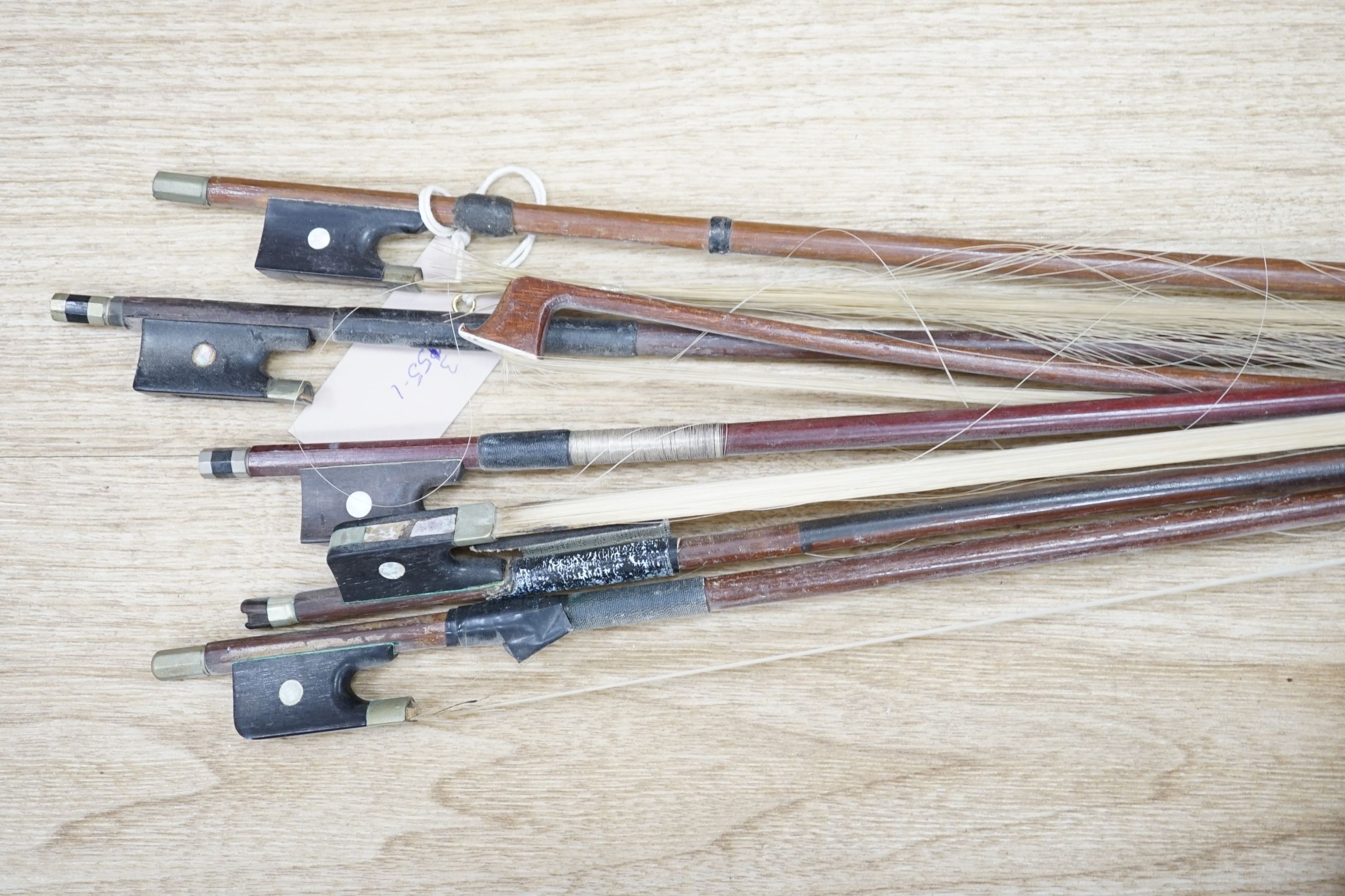 A Viola, assorted bows and a violin back